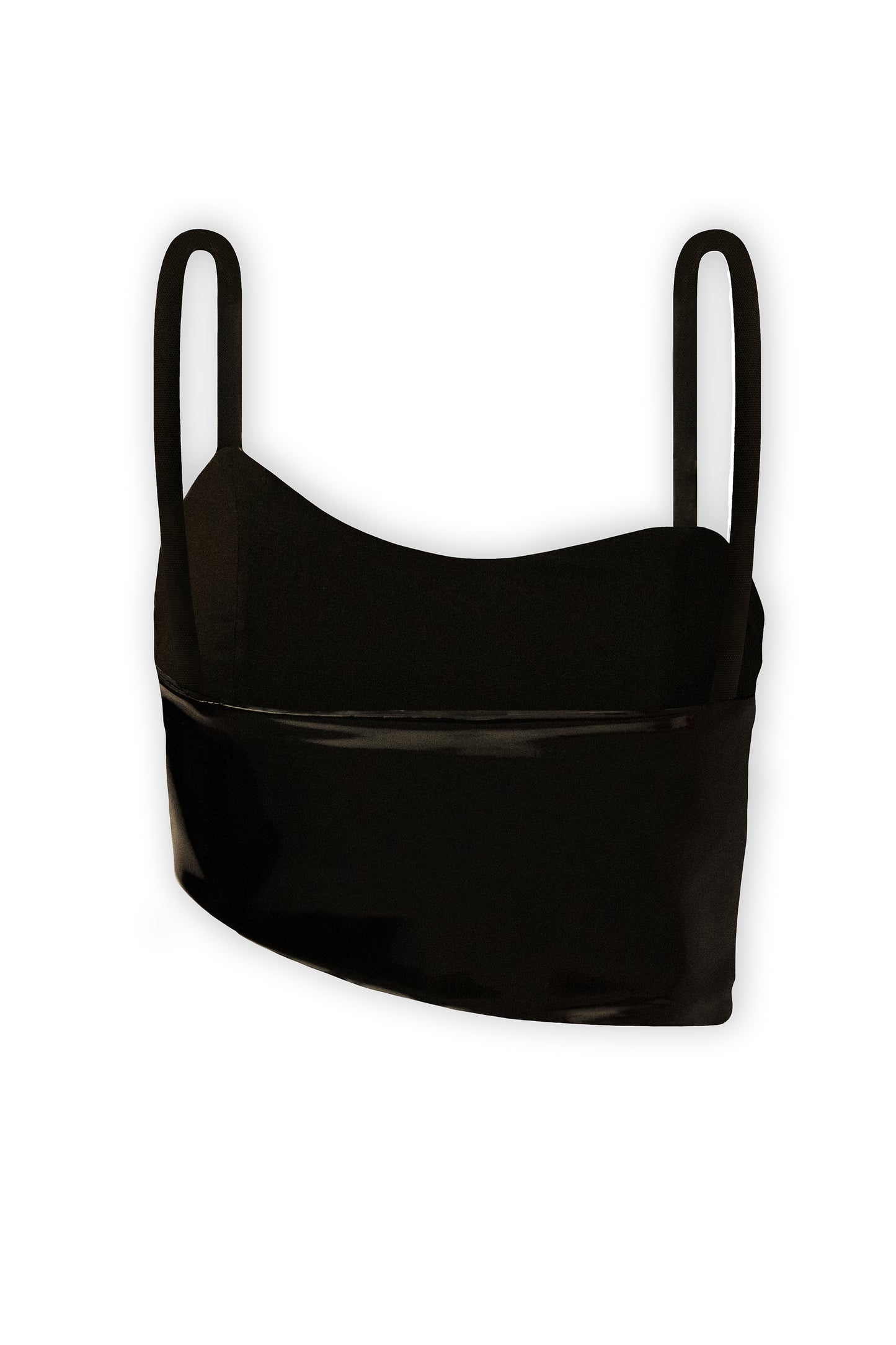 The photograph presents a black asymmetric crop top with rope straps. It is made from 100% eco leather, closed with soft lining. The asymmetric crop top photograph is from the back on a white background.