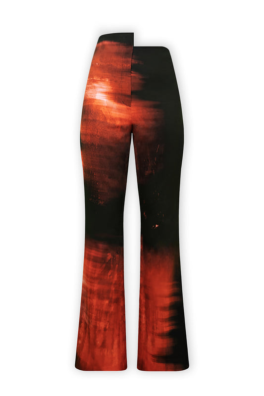 Cut-out pants with stepping on the waist and print. The print is inspired to recreate a woman's body movement of the exact moment when feeling satisfaction is presented in an abstract way. The stepped pants photograph is from the front on a white background.